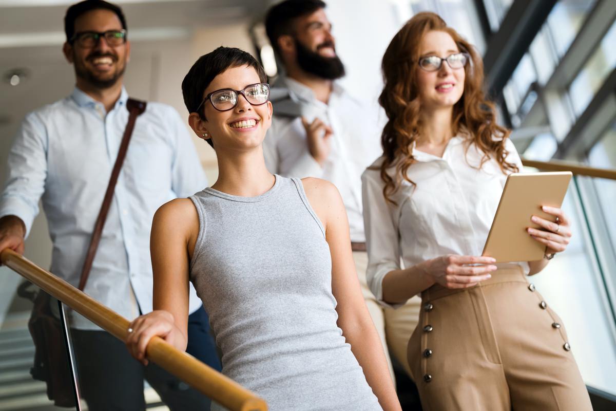 group of employees walking downstairs